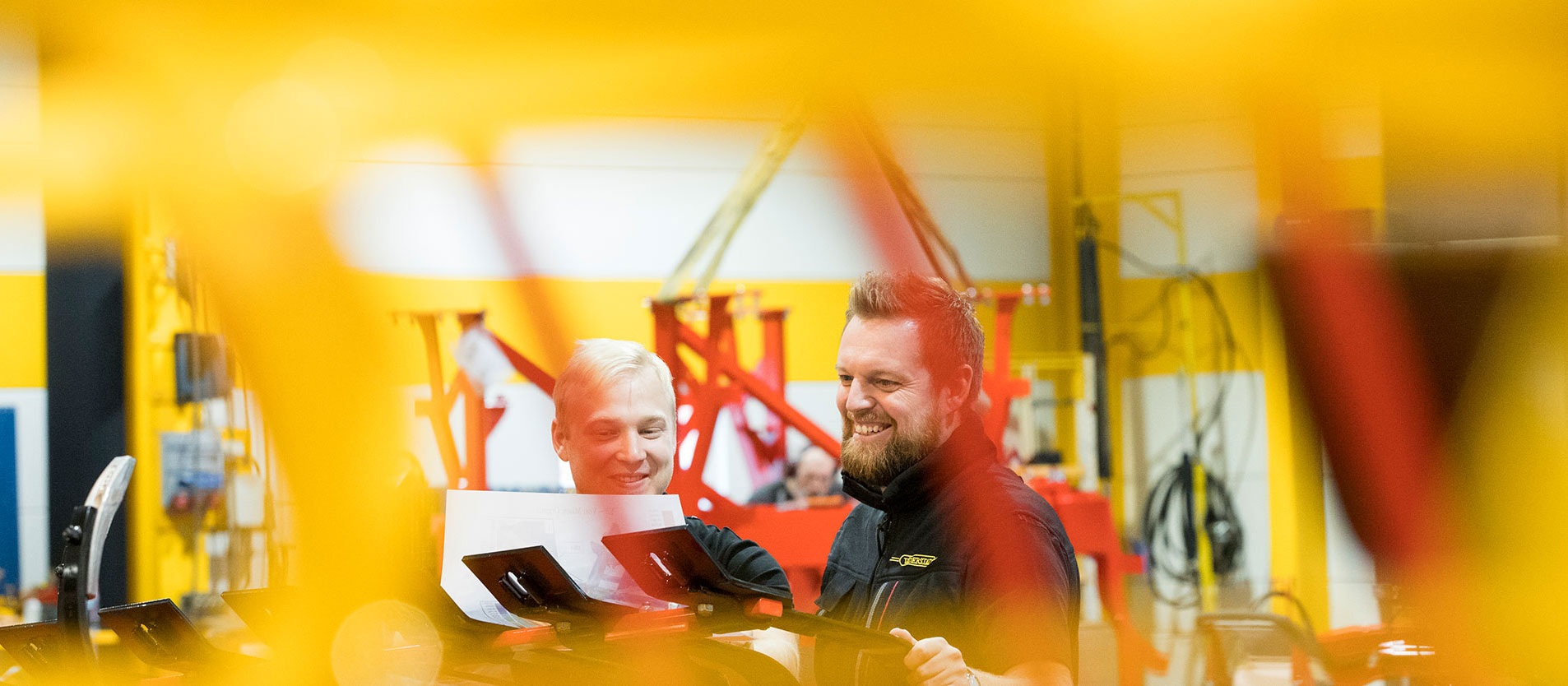 Two people laughing with together.