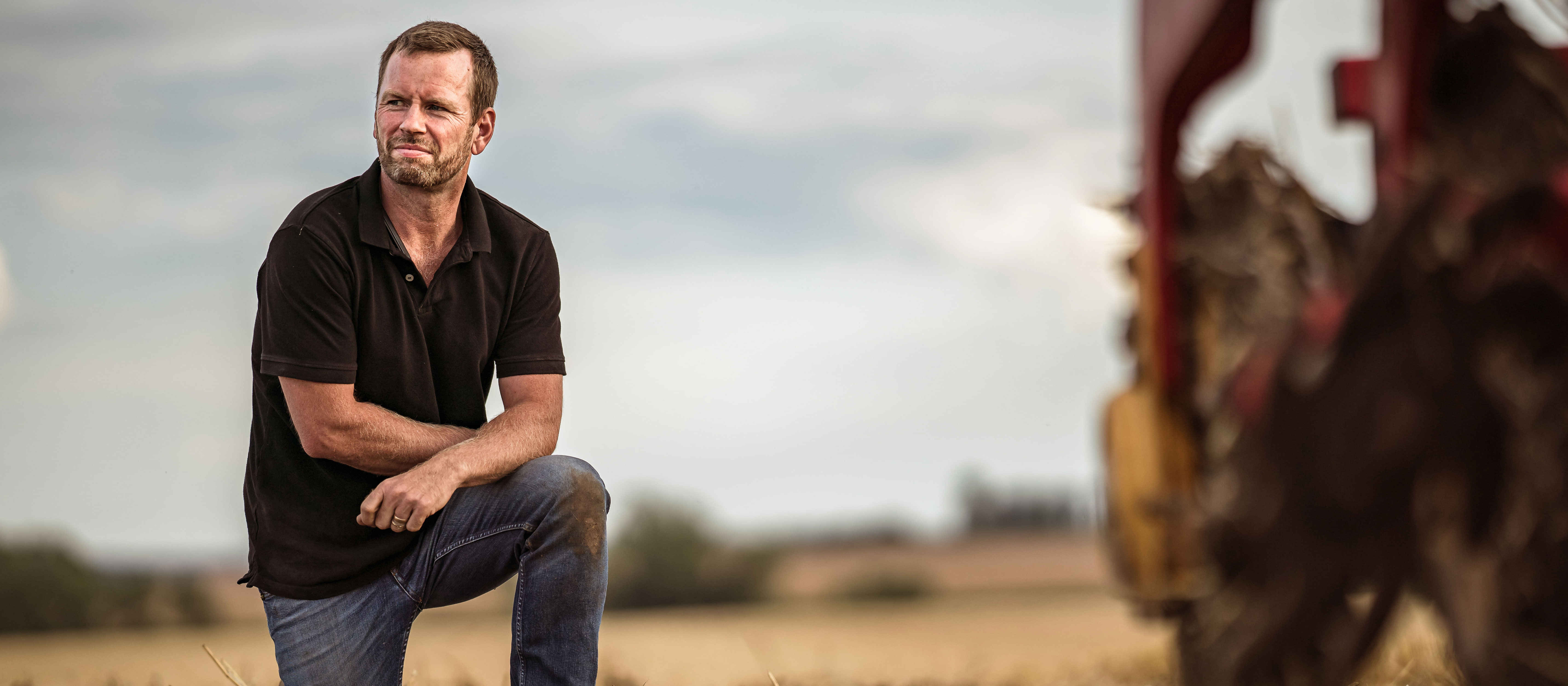 Farmer standing on the field.