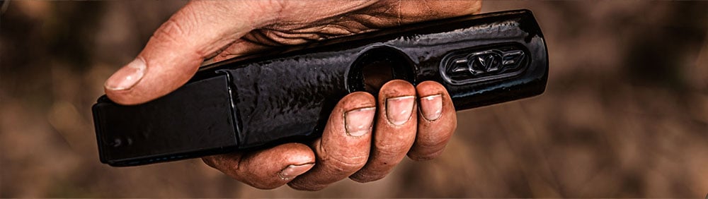 Detailed view of someone holding a Väderstad Marathon point in their hand