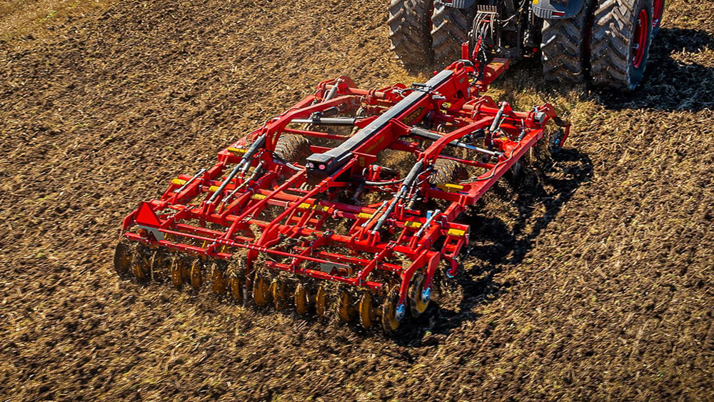 TopDoen combination cultivator working in a field