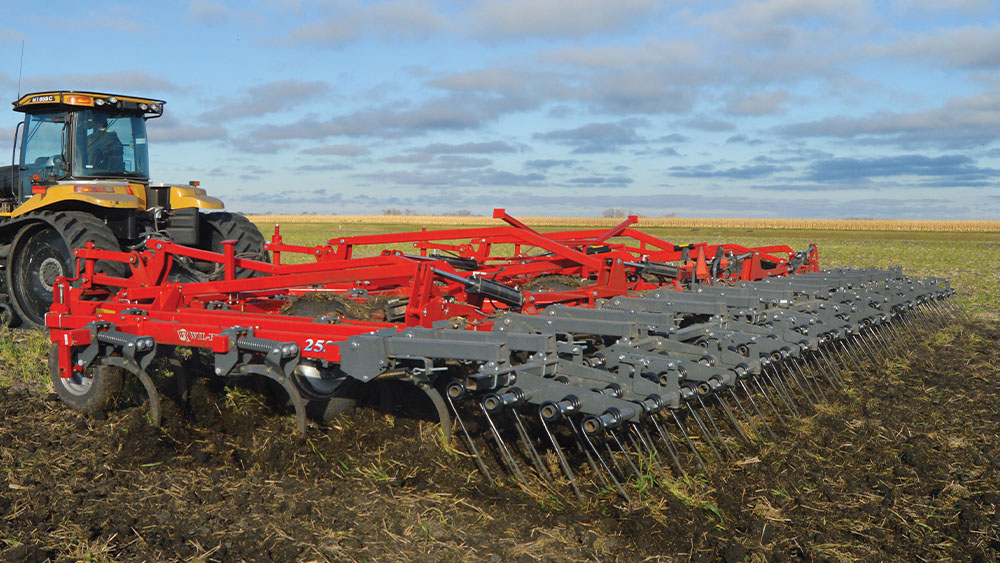 Wil-Rich 2500 Series Chisel Plow working on a field