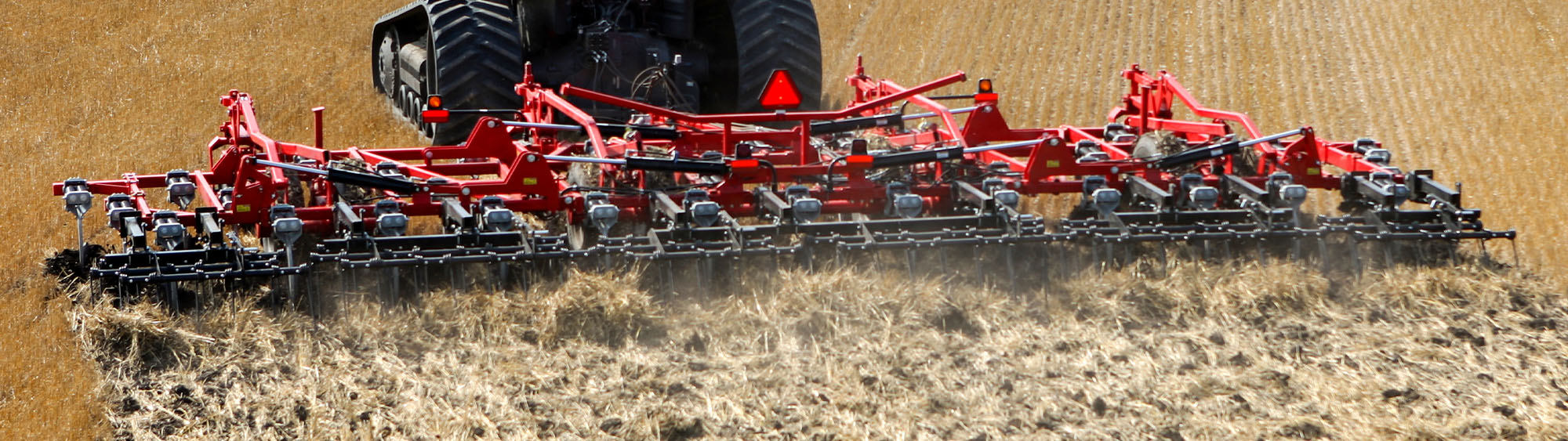 Wil-Rich 2500 Series Chisel Plow working a field