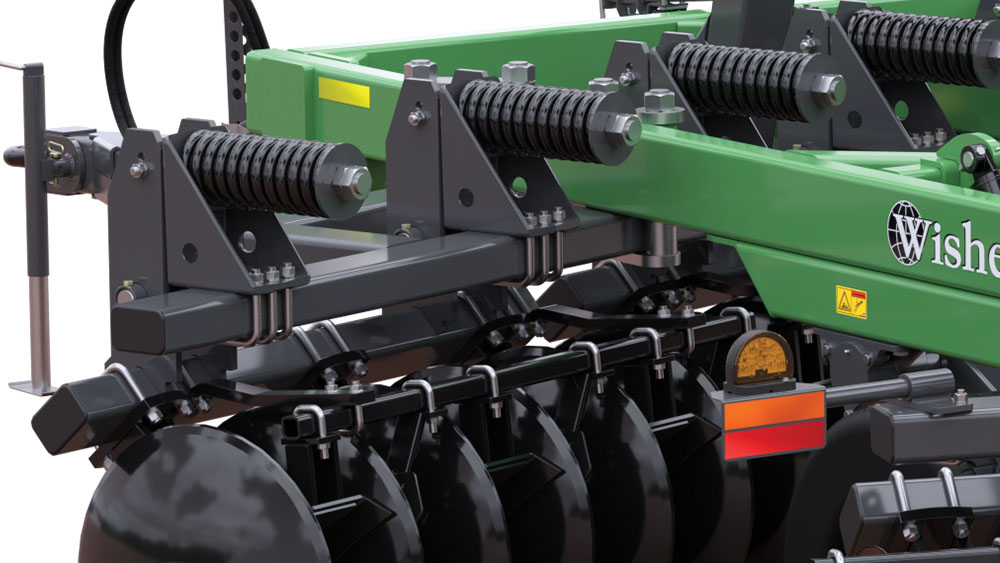 Close-up on the spring-cushioned gangs on a Wishek 842N Offset Disc cultivator