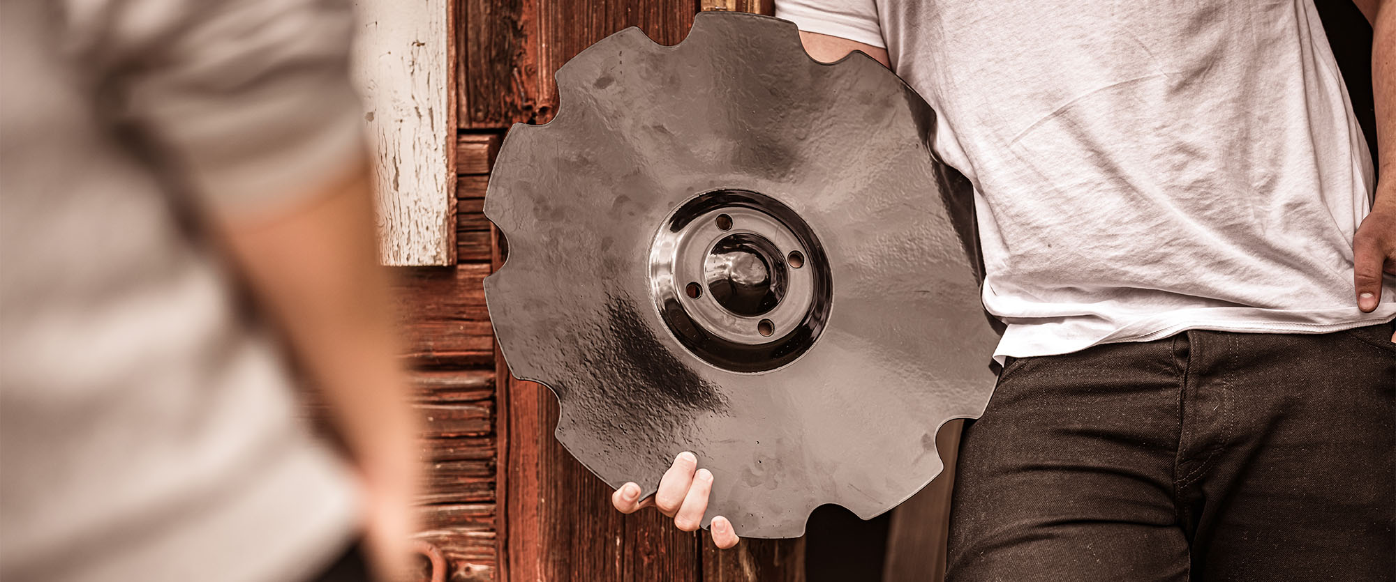 Close-up of someone holding a Väderstad TrueCut Disc in their hand.