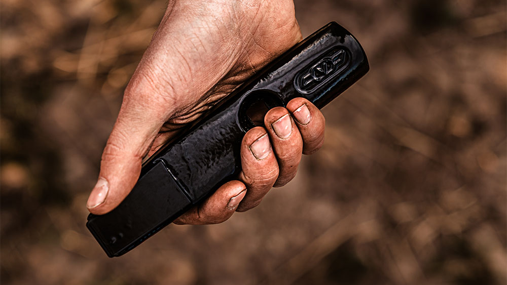 Close-up of someone holding a Väderstad Marathon point in their hand