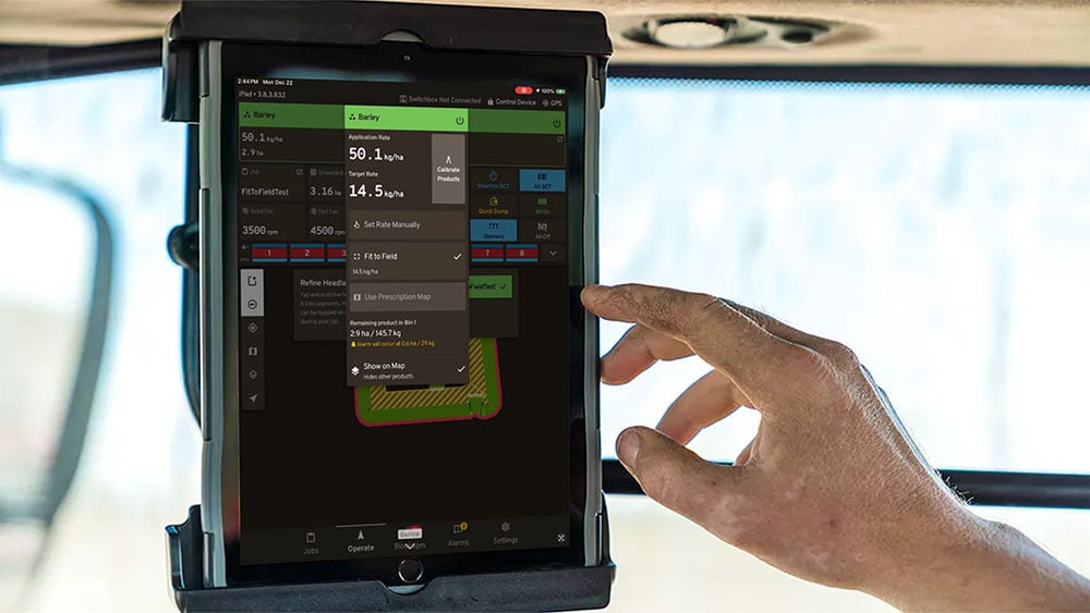 iCon Wireless Control System on an iPad in a tractor