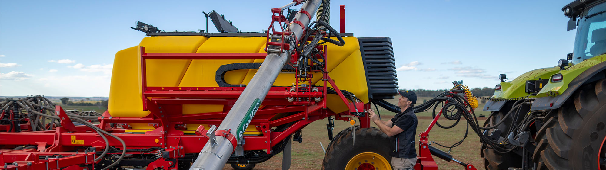 A hopper with a stainless steel filling auger.