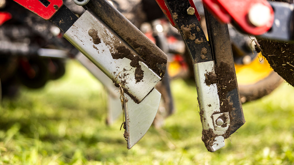 Close-up of tine coulters mounted on a Seed Hawk 900C seed drill.