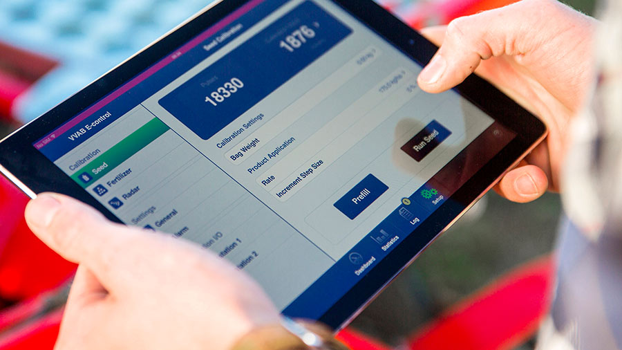 Man holding iPad with E-Control