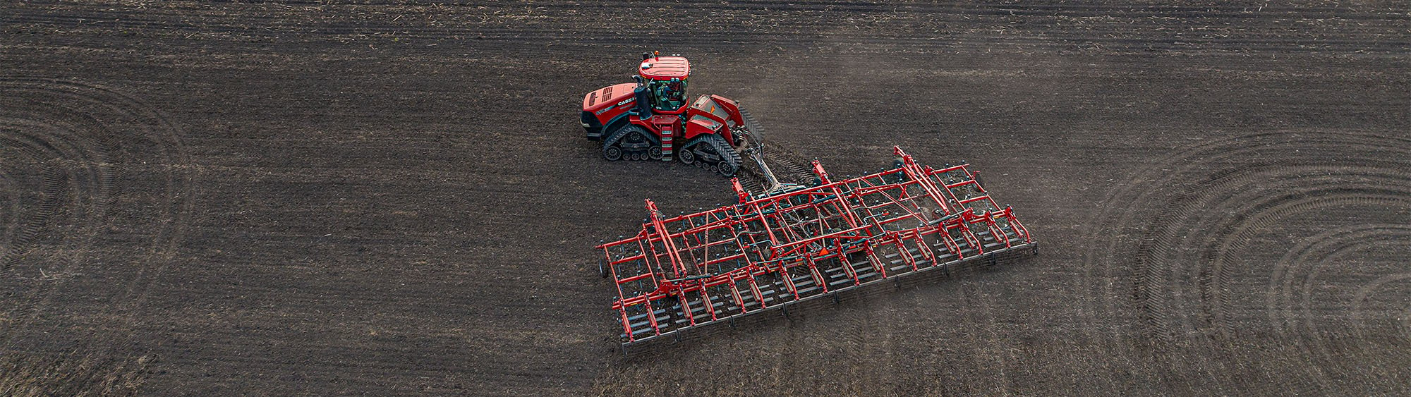 Aerial photo of a Wil-Rich QX2 working in a field