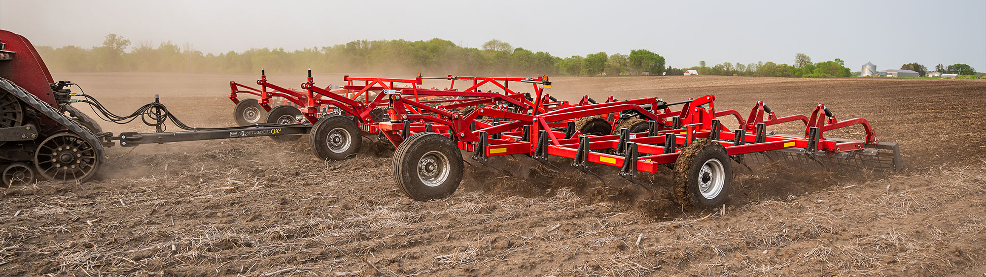 Wil-Rich field cultivator working in a field