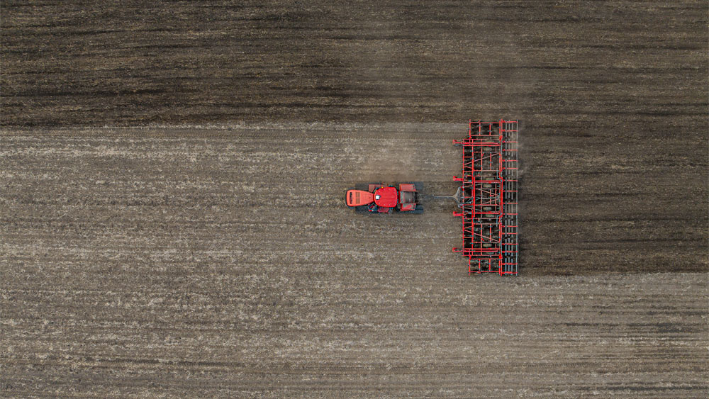 Aerial photo of  Wil-Rich field cultivator working on a field