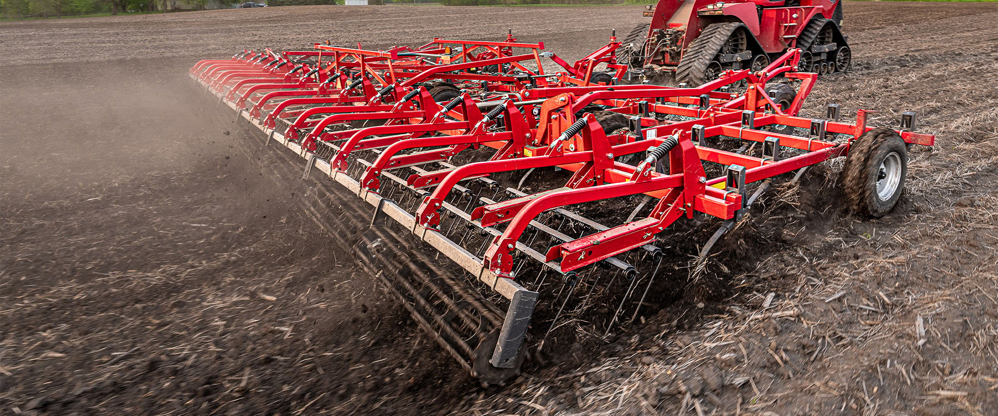 Wil-Rich XL2 field cultivator working on a field