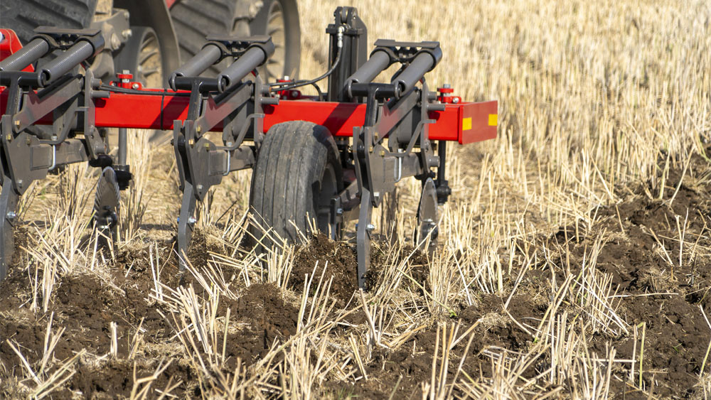 Close-up of Wil-Rich 357 Inline Ripper working the soil