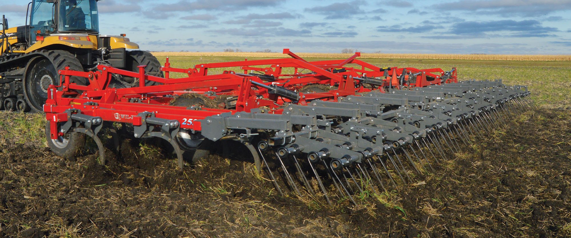 Wil-Rich 2500 Chisel Plow working in a field